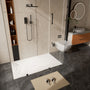 Curbless SMC Shower Base with Flamed Rock Slip-Resistant Surface, Reversible Drain