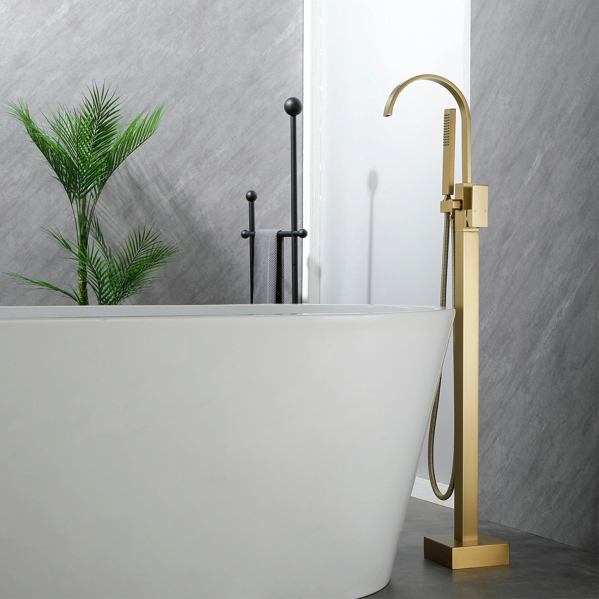 360° Swivel Waterfall Freestanding Bathtub Faucet with Hand Shower in Brushed Gold