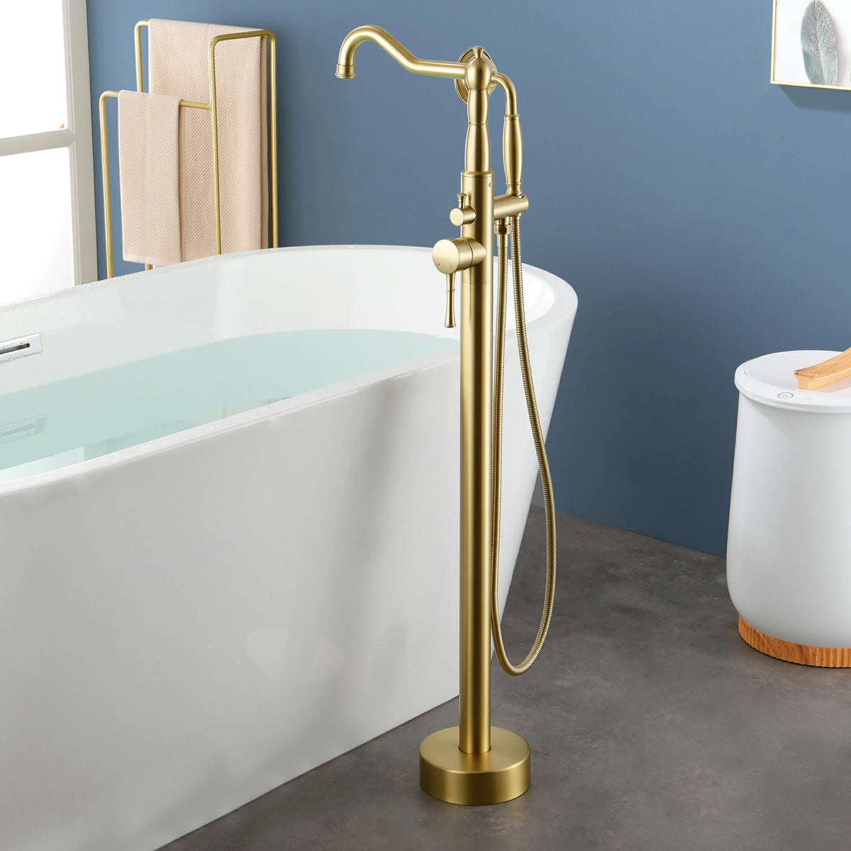 360° Swivel Waterfall Freestanding Bathtub Faucet with Hand Shower in Brushed Gold