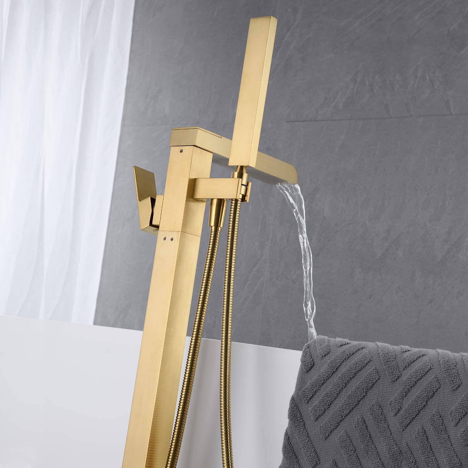 Single-Handle Freestanding Waterfall Bathtub Faucet with Handheld Shower