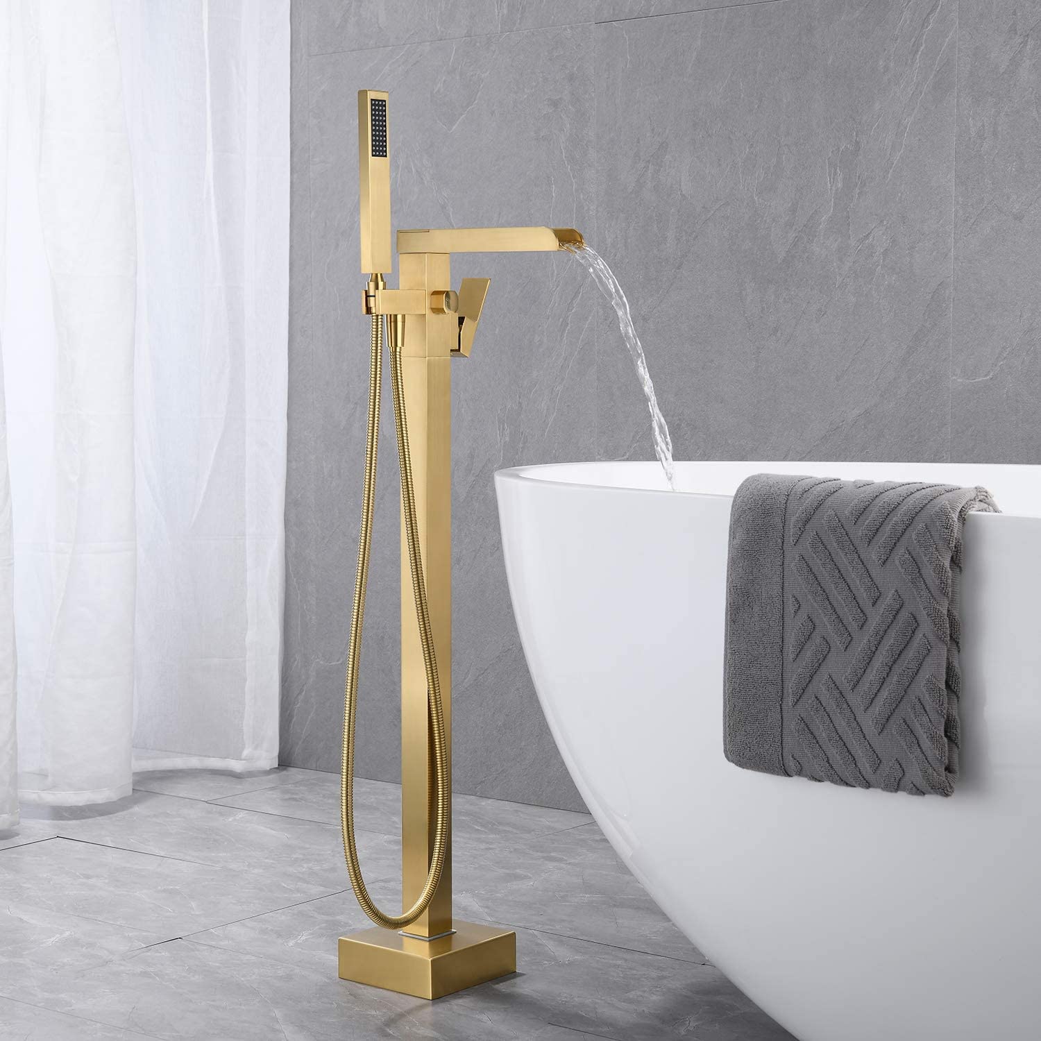 Single-Handle Freestanding Waterfall Bathtub Faucet with Handheld Shower