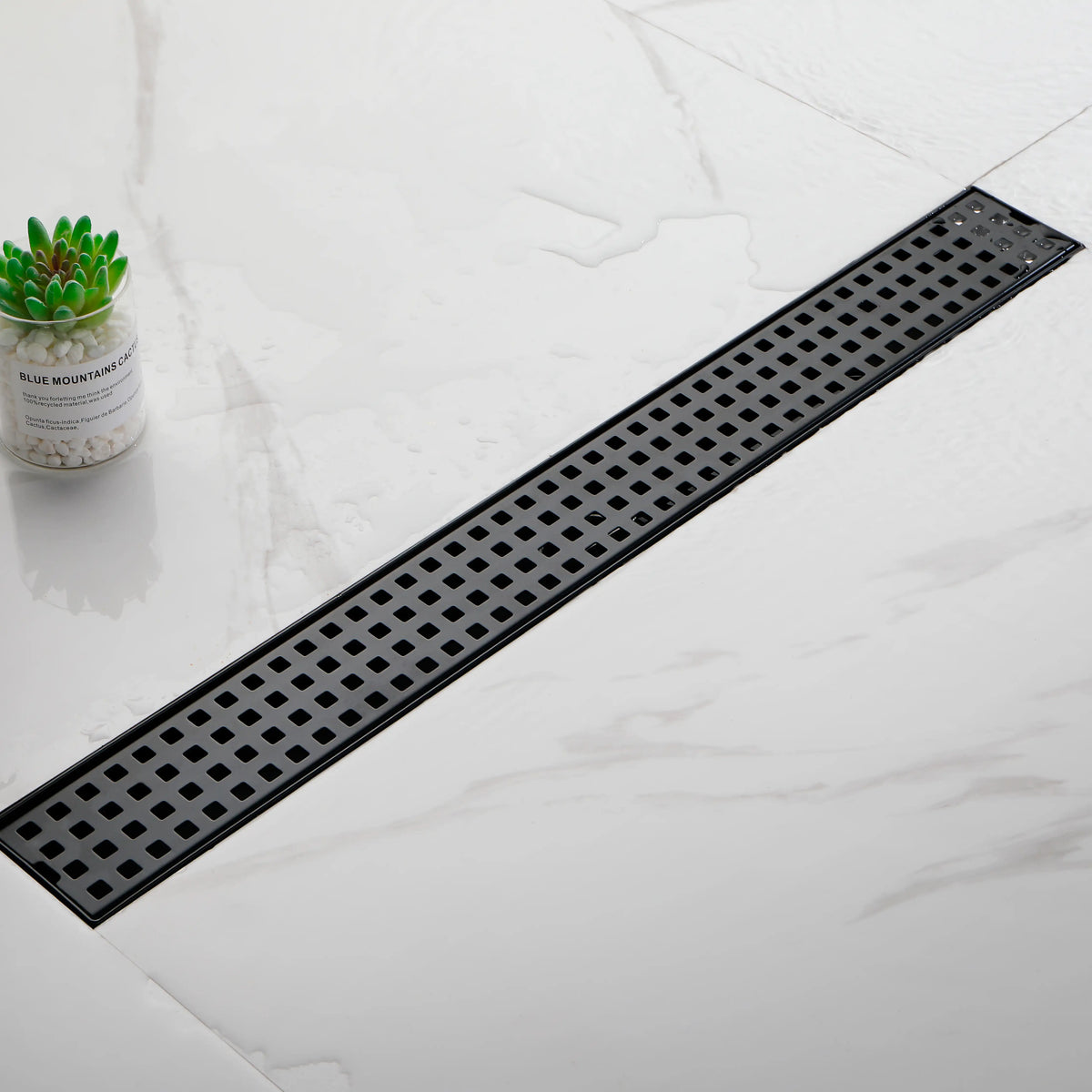 24 Inch Linear Shower Drain in 304 Stainless Steel with Removable Patterned Grate Hair Strainer and Leveling Feet