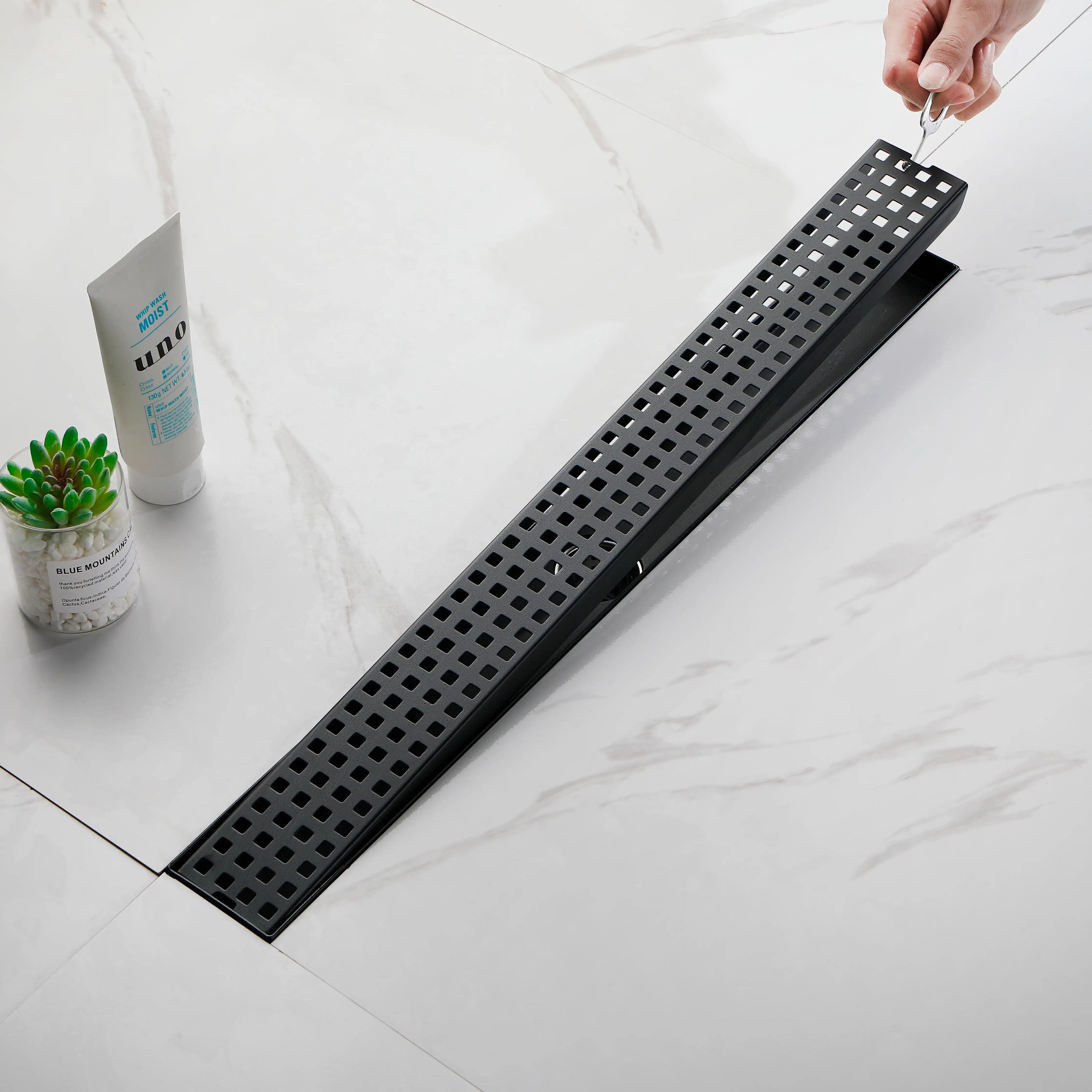 24 Inch Linear Shower Drain in 304 Stainless Steel with Removable Patterned Grate Hair Strainer and Leveling Feet