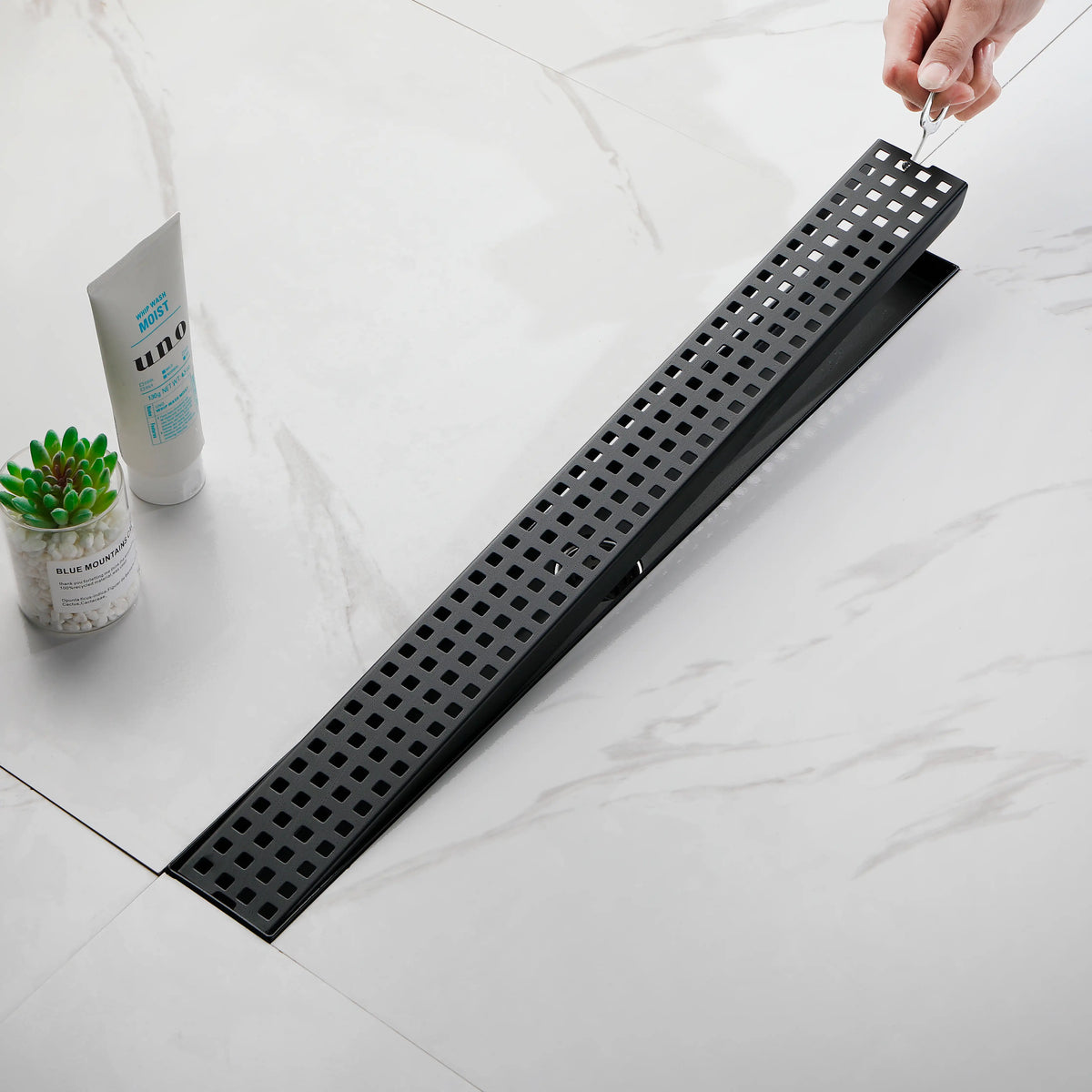 24 Inch Linear Shower Drain in 304 Stainless Steel with Removable Patterned Grate Hair Strainer and Leveling Feet