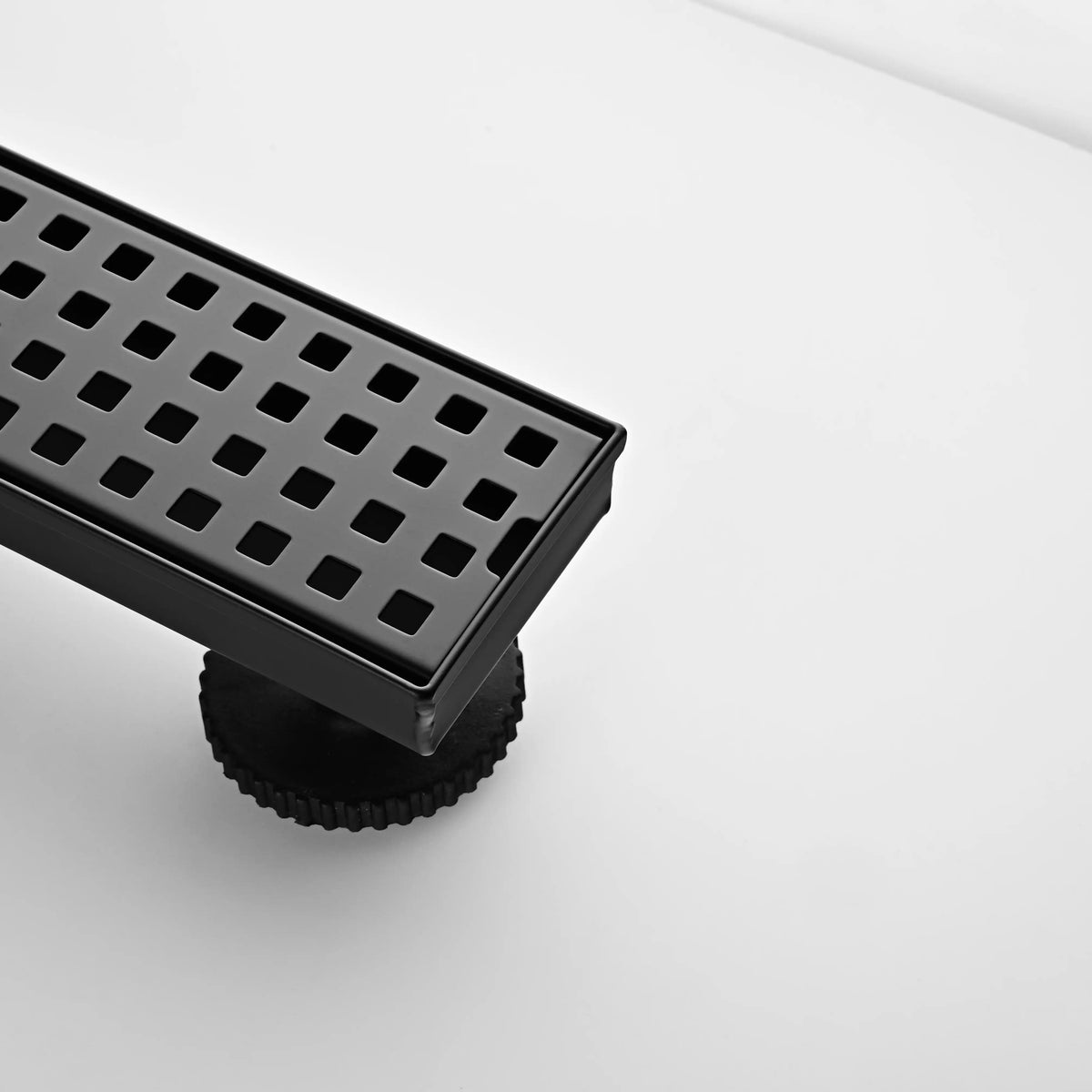 24 Inch Linear Shower Drain in 304 Stainless Steel with Removable Patterned Grate Hair Strainer and Leveling Feet