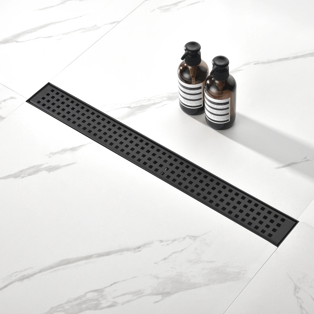 28-Inch Linear Shower Drain in 304 Stainless Steel with Removable Patterned Grate Hair Strainer and Leveling Feet