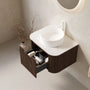 Floating Bathroom Vanity with Curved Edges, Fluted Drawer Fronts, Carrara Sintered Stone Top and Round Ceramic Vessel Sink, Natural Woodgrain / Dark Walnut