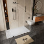 Curbless SMC Shower Base with Flamed Rock Slip-Resistant Surface, Reversible Drain