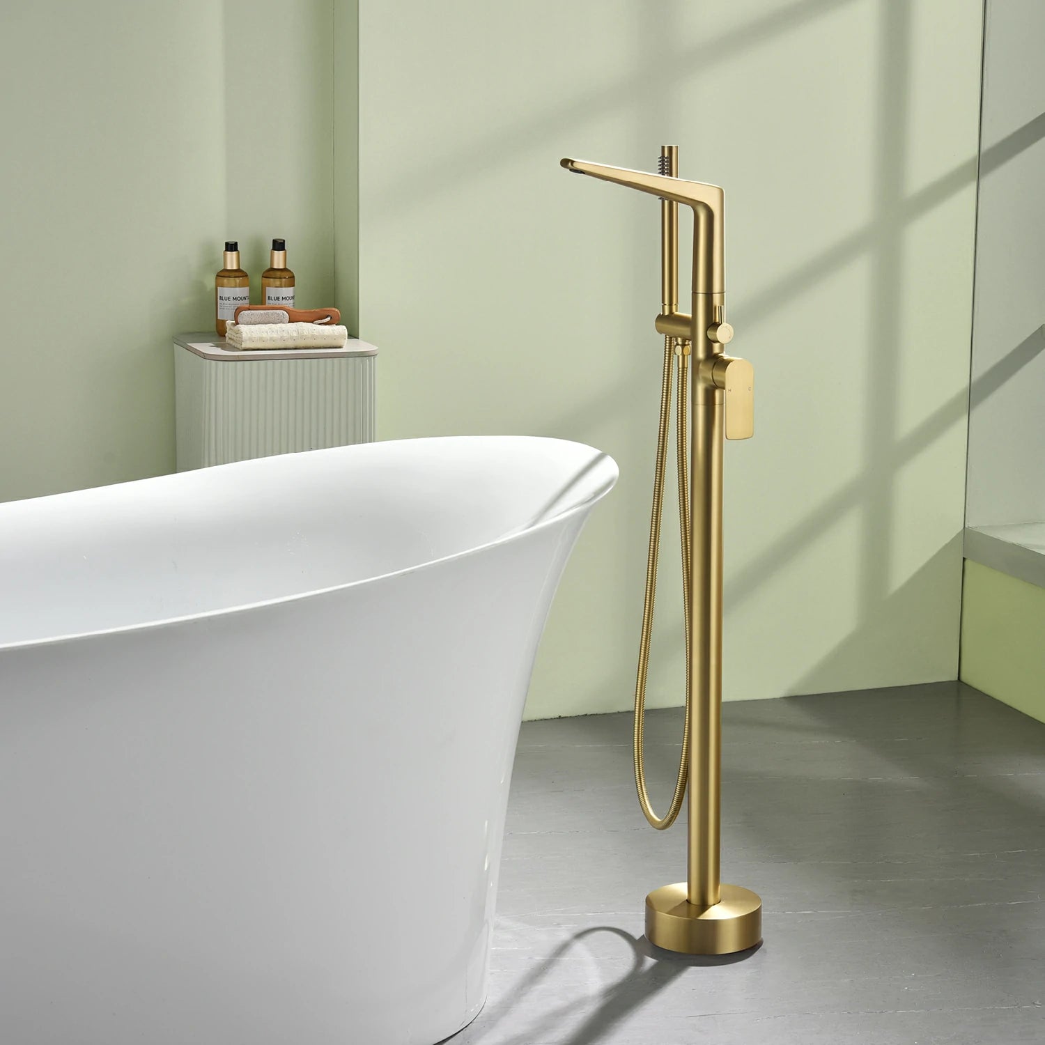 One-Piece Brass Waterfall Freestanding Bathtub Faucet with Hand Shower in Brushed Gold