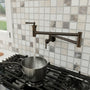 360° Dual-Handle Brass Pot Filler Faucet for Kitchen Wall-Mount Installation